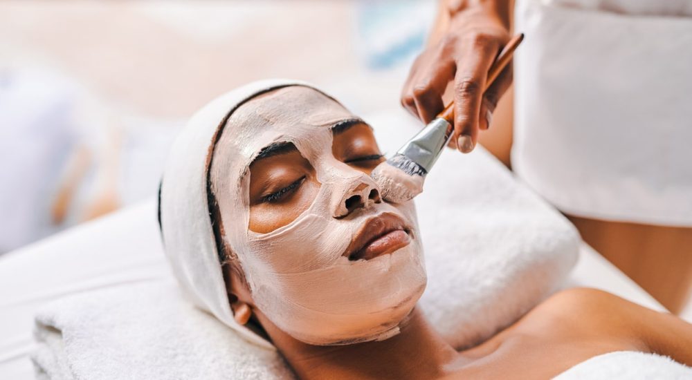 Shot of an attractive young woman getting a facial at a beauty spa